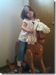 Lily on the hobby horse